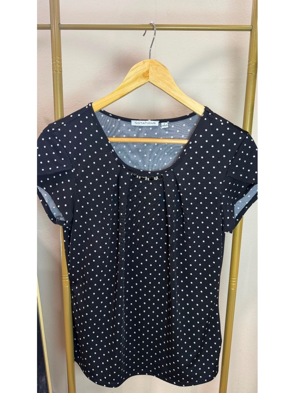 Size S Notations  a white polka dot  embellished neckline